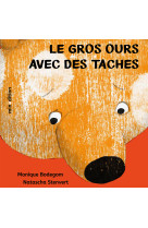 Le gros ours avec des taches